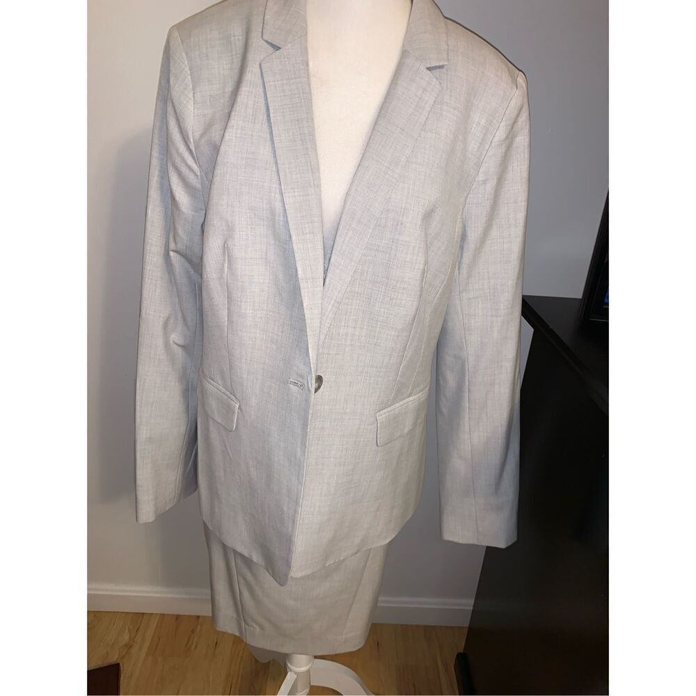 The limited light, gray suit, size 12 jacket and 10 skirt